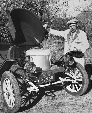 Harry Waber with Petersen boiler in his Stanley